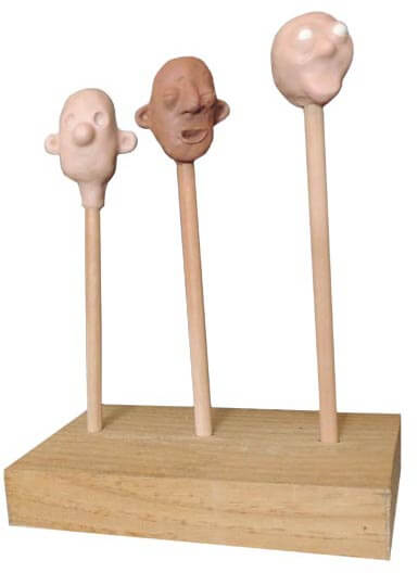 Various heads in progress for a claymation puppet for Adobe Character Animator